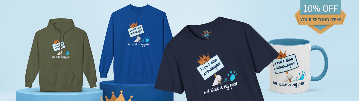 Pawtograph collection banner — navy tee front and center with the I don't sign autographs crown design, olive hoodie, royal sweatshirt and mug, 10% off your second item